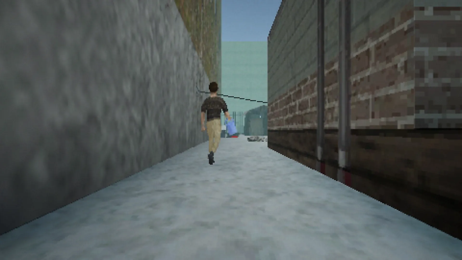 The man walks down a narrow, snowy alley between brick walls