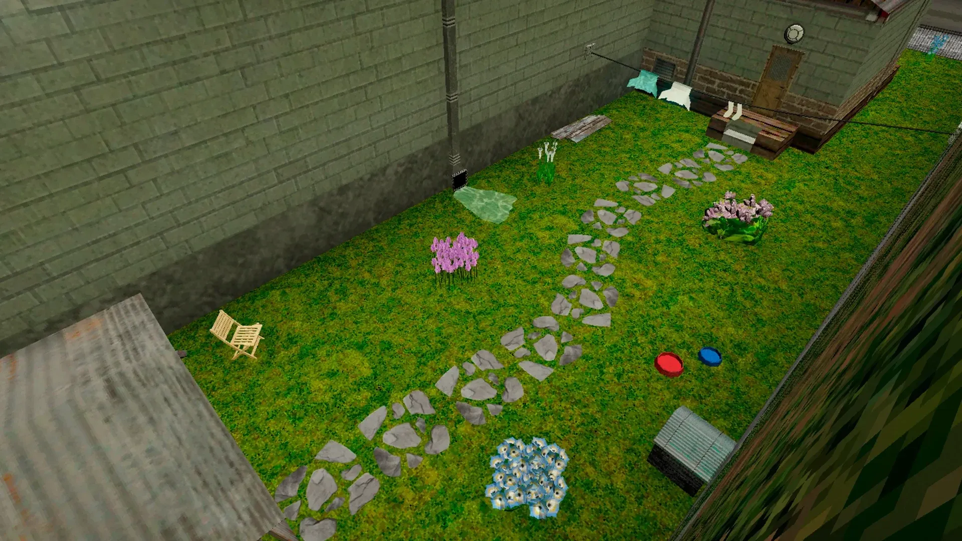 The garden in summer from above, with green grass and flowers in bloom